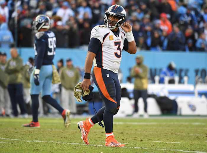 Denver Broncos quarterback Russell Wilson (3) walks off the field after throwing an interception to end the game during the second half against the Tennessee Titans at Nissan Stadium.